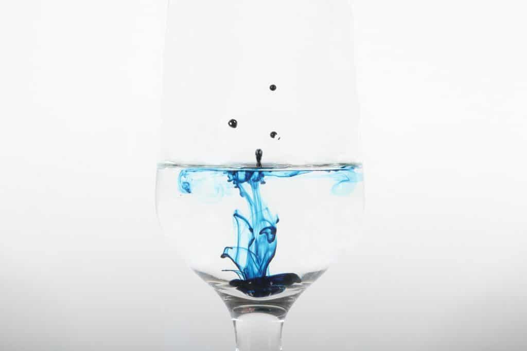 clear glass with blue ink dropped illustration